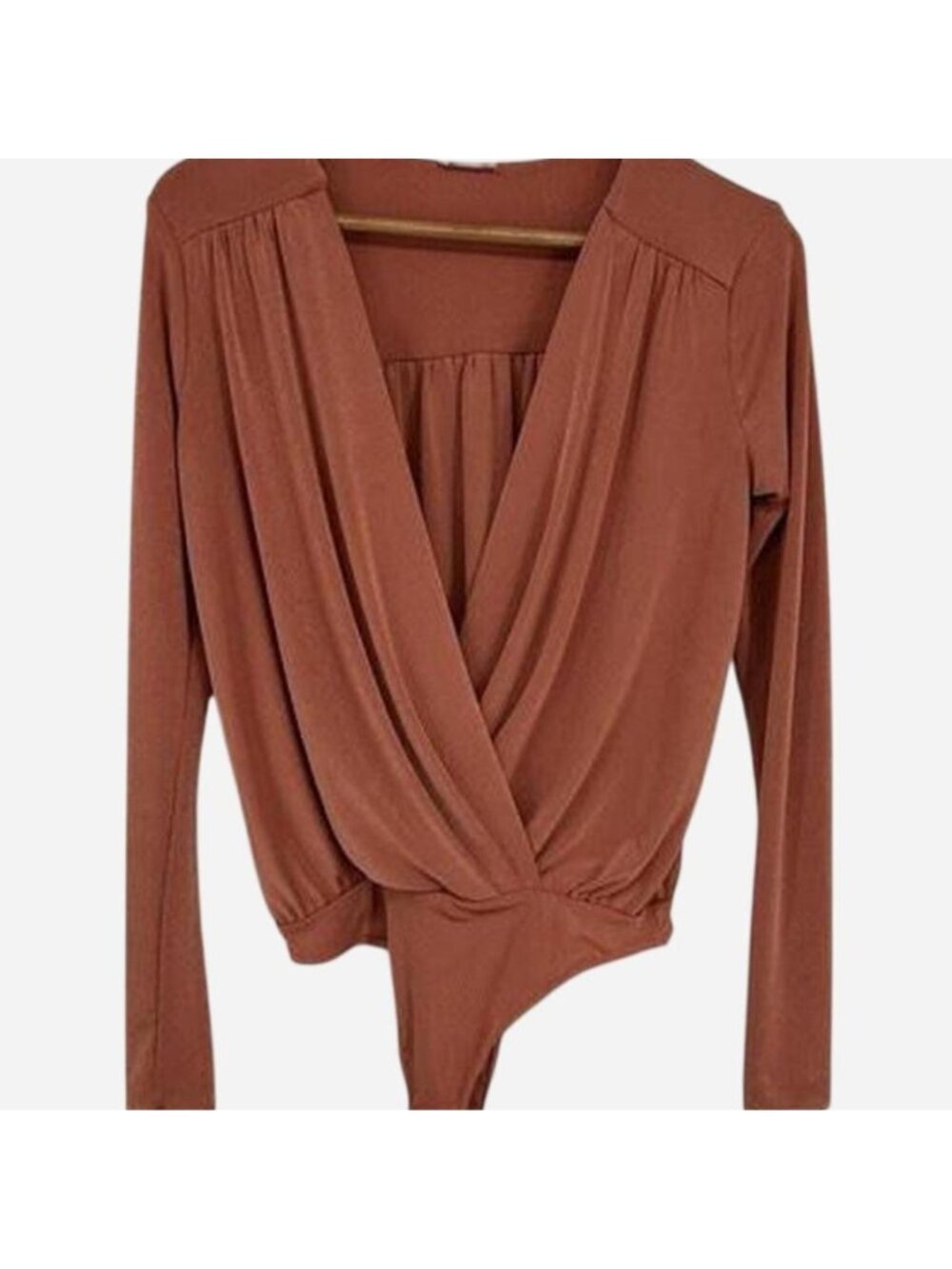 Free People bodysuit with long sleeves and wrap...